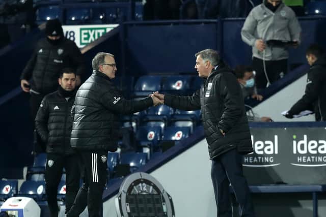 Marcelo Bielsa, then-manager of Leeds United and Sam Allardyce, then-manager of West Bromwich Albion shake hands after the Premier League match between West Bromwich Albion and Leeds United at The Hawthorns on December 29, 2020 (Photo by David Rogers/Getty Images)