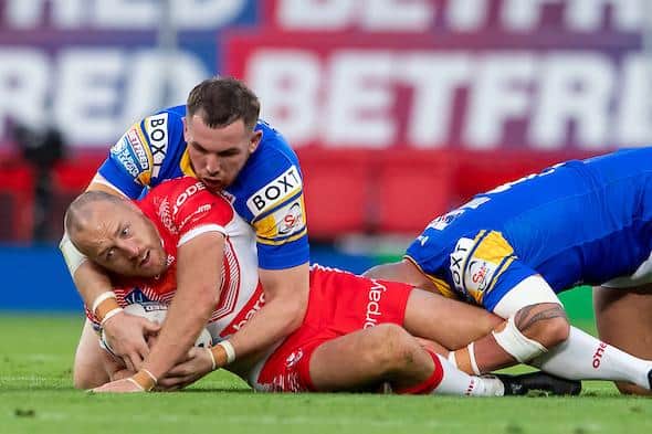 Saints' James Roby is tackled by Cameron Smith during last year's Super League Grand Final. Picture by Allan McKenzie/SWpix.com.