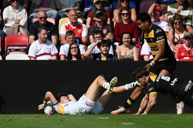 Riley Lumb scores the second of his three tries in Leeds Rhinos' 66-16 win at York Knights. Picture by Matthew Merrick/SWpix.com.
