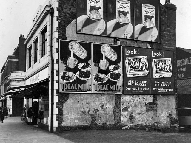 The gable end of Stephenson's shop on Hunslet Road pictured in September 1934 showing advertisements for Ideal Milk, Libby's Evaporated Milk and Compo Washing Powder.