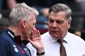 West Ham United's Scottish manager David Moyes (L) greets Leeds United's English head coach Sam Allardyce ahead of the English Premier League football match between West Ham United and Leeds United at the London Stadium, in London on May 21, 2023. (Photo by Ben Stansall / AFP) / RESTRICTED TO EDITORIAL USE. No use with unauthorized audio, video, data, fixture lists, club/league logos or 'live' services. Online in-match use limited to 120 images. An additional 40 images may be used in extra time. No video emulation. Social media in-match use limited to 120 images. An additional 40 images may be used in extra time. No use in betting publications, games or single club/league/player publications. /  (Photo by BEN STANSALL/AFP via Getty Images)