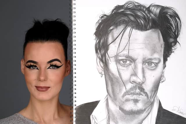 Artist Chloe Alexia with her pencil drawing of Johnny Depp