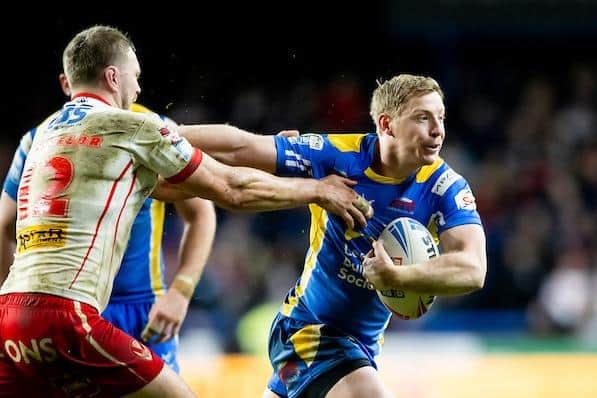Leeds Rhinos' Lachie Miller carries the ball agianst St Helens. Picture by Allan McKenzie/SWpix.com.