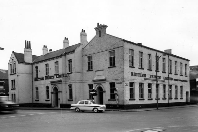 The premises of British Paints Ltd situated at the junction of Spence Lane and Whitehall Road in March 1965. This building had originally been a Zion School. A branch library serving Holbeck and New Wortley opened here in 1870, closing in 1938. The building was used by Whitehall Motors Ltd, used car dealers in the 1940s.
