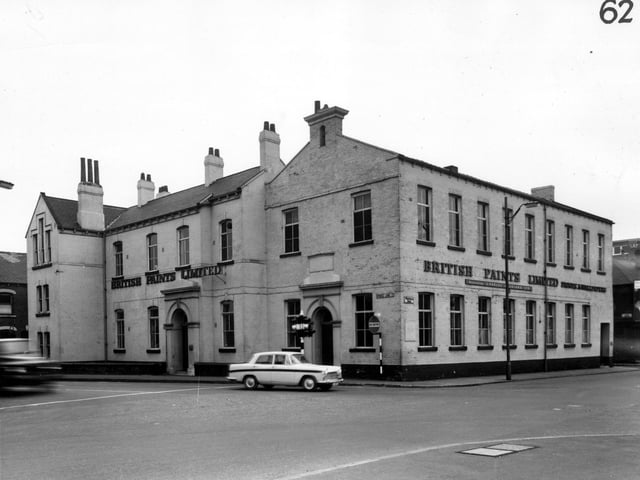 The premises of British Paints Ltd situated at the junction of Spence Lane and Whitehall Road in March 1965. This building had originally been a Zion School. A branch library serving Holbeck and New Wortley opened here in 1870, closing in 1938. The building was used by Whitehall Motors Ltd, used car dealers in the 1940s.