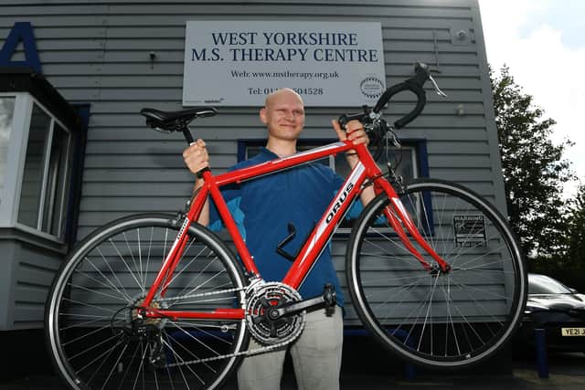 Dan Goodwin, 24, from the West Yorkshire MS Therapy Centre is cycling from John O'Groats to Land's End on the Sustrans route to raise money to continue offering therapy in the cost of living crisis. Photo: Jonathan Gawthorpe