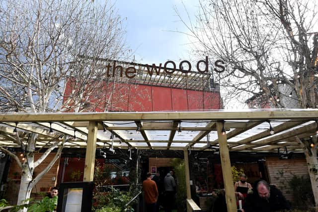 The Woods offers outdoor space on a front terrace as well as on the roof.