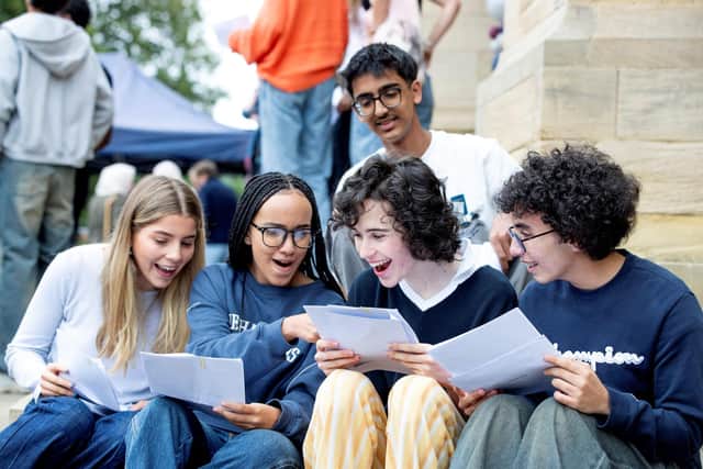 Rufus Baxter, Liberty Preston, Anna Schlosshan, Abrahim Taher and Navjot Singh were delighted to find they each had a string of grade 9s. Photo: Bradford Grammar School