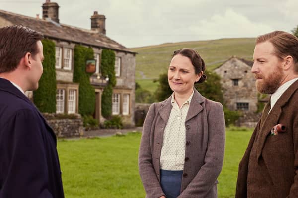 Filming has started in the Yorkshire Dales for Series 6 of All Creatures Great And Small, although as yet, cast and crew have not been spotted in their usual fliming locations. In this scene from series four, right to left, James Herriot (Nicholas Ralph) is with Mrs Hall (Anna Madeley) and Siegfried Farnon (Samuel West). Picture: Channel 5, Playground, Helen Williams