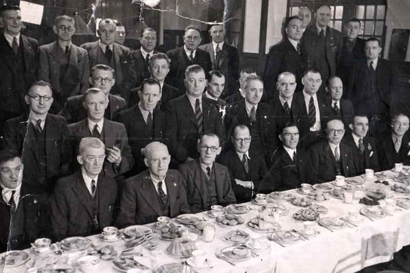Group dinner at Wadsley Bridge Working Men's Club, 1950s. Ref no: T13175