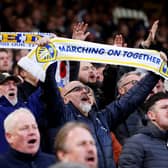 LEEDS, ENGLAND - APRIL 25: Leeds United fans show their support with scarfs during the Premier League match between Leeds United and Leicester City at Elland Road on April 25, 2023 in Leeds, England. (Photo by Alex Livesey/Getty Images)