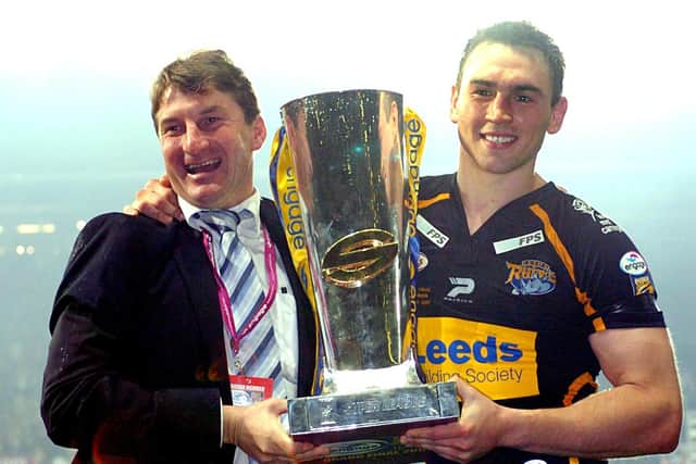 Then-Leeds coach Tony Smith and captain Kevin Sinfield show off the Super League trophy at Old Traffordn in 2007. Picture by Jonathan Gawthorpe.
