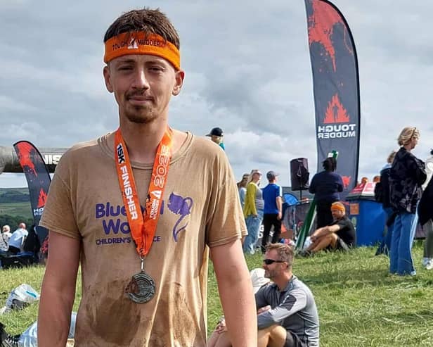 Tom Hill after finishing the Tough Mudder challenge