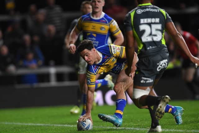 Brodie Croft scores Leeds Rhinos' second try in trheir loss to Catalans Dragons. Picture by Jonathan Gawthorpe