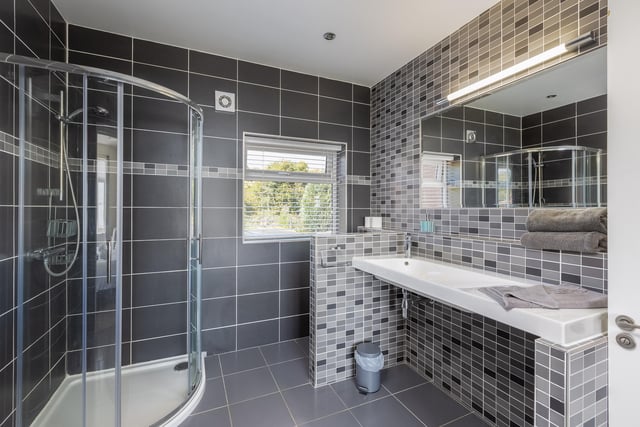An on-trend shower room in grey.