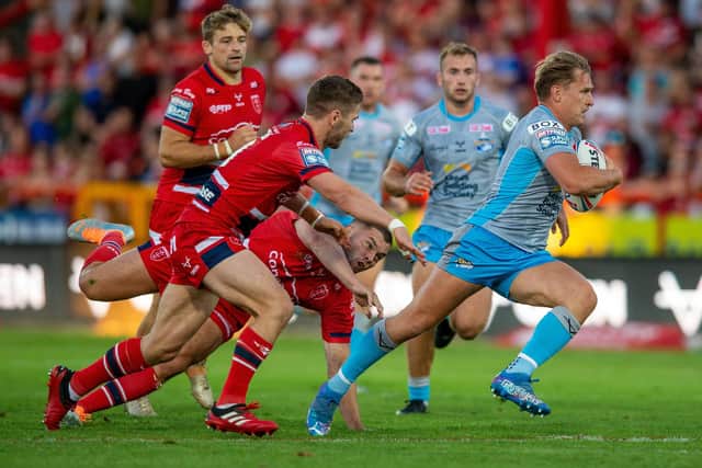 Brad Dwyer on his way to scoring for Rhinos at Hull KR two weeks ago. Picture by Bruce Rollinson.