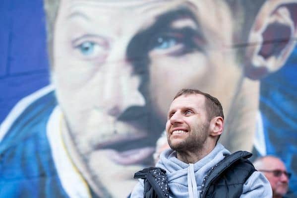 Rob Burrow with the mural in his honour at Leeds University. Picture by Allan McKenzie/SWpix.com.