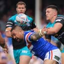 Owen Trout forces the ball loose from Wakefield Trinity's Tinirau Arona during one of his three first team appearances for Leeds Rhinos in 2019. Picture by Alex Whitehead/SWpix.com.