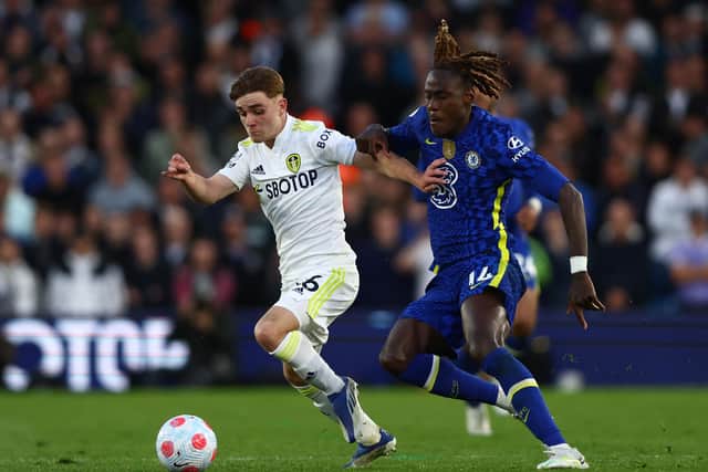 LEEDS, ENGLAND - MAY 11: Lewis Bate of Leeds United is challenged by Trevoh Chalobah of Chelsea  during the Premier League match between Leeds United and Chelsea at Elland Road on May 11, 2022 in Leeds, England. (Photo by Clive Brunskill/Getty Images)