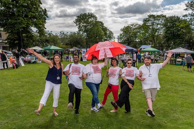 Pictured at The Great Get Together held at Green Park, Heckmondwike, in 2019 are Helen Horvath of Kirkwood Hospice; Bilal Almayalt; Tracey King; Parveen Butt; Theresa Redmond; and Adrian Cunningham of Kirkwood Hospice