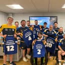 Leeds Rhinos legend Danny McGuire, right of picture, presented the club's wheelchair side with their playing jerseys for Saturday's Challenge Cup final agianst Halifax Panthers. Picture by James Simpson.