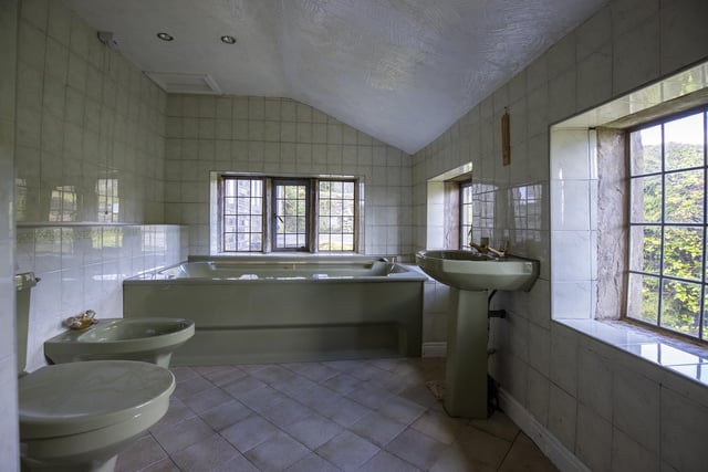 The family bathroom has both bath and shower cubicle.