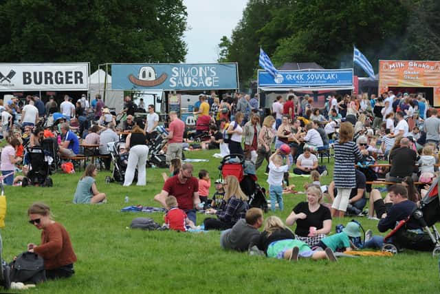 Crowds gather on the lawn at Harewood House as food vendors serve up at the Great British Food Festival. Picture: Steve Riding