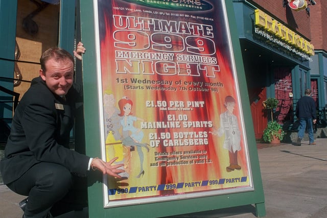 This poster featuring a cartoon character of a nurse to promote a 999 night at Brannigans was causing controversy. Pictured with the poster is Brannigans bars and restaurant manager Hugo Watters.