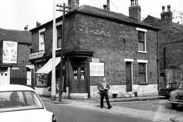Cambridge Road, on the left is the end of Vaughan Street, next number 26 is a hardware shop, business of Keith and son. Then number 24 is S.Appletons shoe shop. Oakfield Street, number 20 can be seen, used as storage area for the shoe shop. Pictured in August 1967.