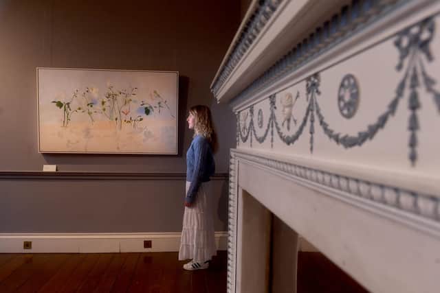 Amelia Stallworthy is pictured with work by the artist Charlotte Verity in the exhibition The Season Following  at Harewood House. Picture: Simon Hulme