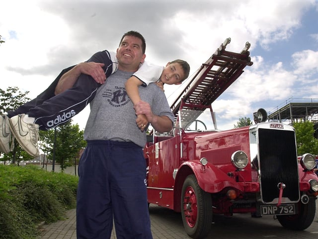 The Red Cross charity joined forces with emergency services to stage a 999 Awareness Day for members of the public at the Royal Armouries Museum. Pictured is firefighter Jonathan Hunter giving visitor Chris Morton a fireman's lift.