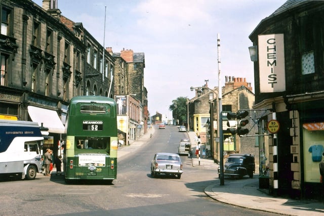 Looking up Chapel Hill from near the traffic lights at the bottom of Queen Street. At this time the bus stop was still by Cheapside at the start of the hill and old established traders were still in the Bottoms e.g. R. A. B. Riley, N. Fox, A. Rogerson (Baxter's), J. Hutchins and Firths shoe repairers.