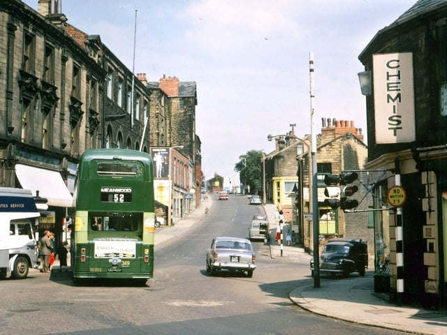 Looking up Chapel Hill from near the traffic lights at the bottom of Queen Street. At this time the bus stop was still by Cheapside at the start of the hill and old established traders were still in the Bottoms e.g. R. A. B. Riley, N. Fox, A. Rogerson (Baxter's), J. Hutchins and Firths shoe repairers.