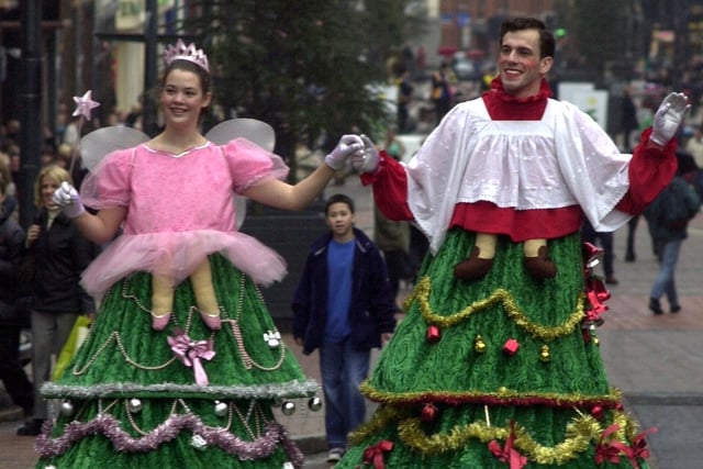 Christmas Trees on stilts  - David Smith and Charlotte Lambert of the Q 20 Theatre Company - were one of the attractions on offer to shoppers on Briggate in December 2000.