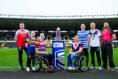Nathan Collins with other Wheelchair Super League players at the competition's 2026 launch at MKM Stadium, Hull, last weekend: left-right Chris Haines (Sheffield), Nathan Collins (Leeds), Toby Burton-Carter (Wigan), Mason Billington (London Roosters), Jack Brown (Halifax), Steve Sampher (Hull FC) and Kieron Johnson (Bradford). Picture by Allan McKenzie/SWpix.com