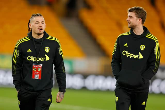 WOLVERHAMPTON, ENGLAND - MARCH 18:  Kalvin Phillips (l) of Leeds United chats to Patrick Bamford before the Premier League match between Wolverhampton Wanderers and Leeds United at Molineux on March 18, 2022 in Wolverhampton, England. (Photo by Malcolm Couzens/Getty Images)