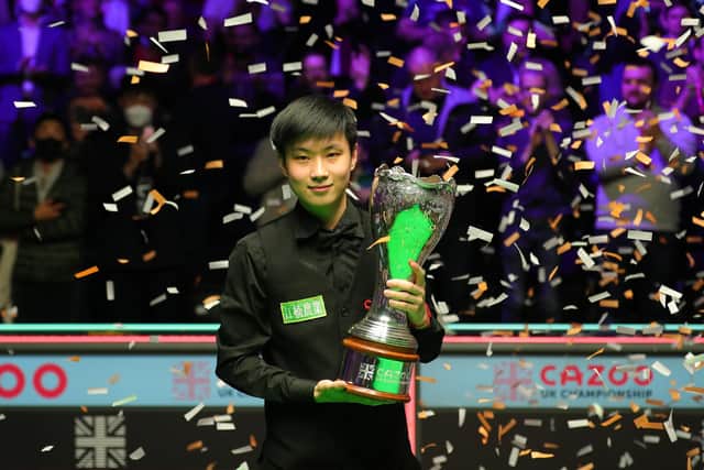 Defending champion Zhao Xintong