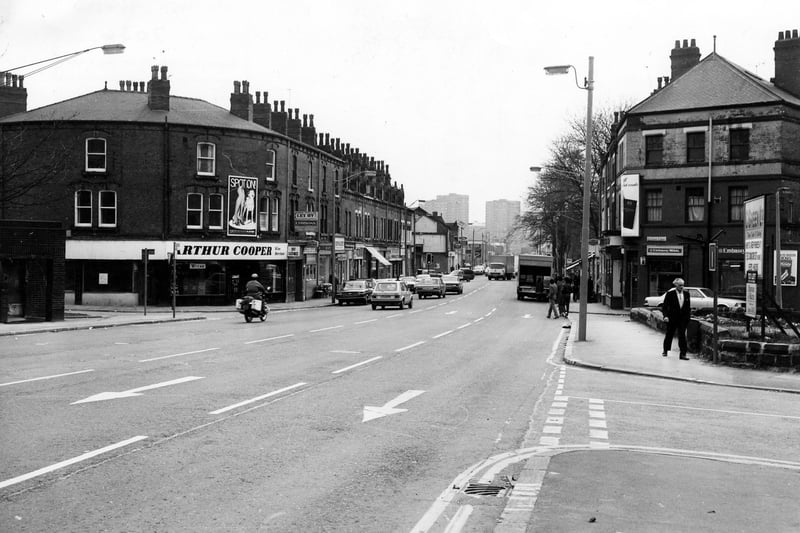 Roundhay Road seen from the junction with Gawthorne Terrace, right, in April 1980. On the left is the curved frontage of Arthur Cooper, wine merchant on Roundhay Road. The photograph is taken looking in the direction of the city centre. The left turn leads into Roseville Road.