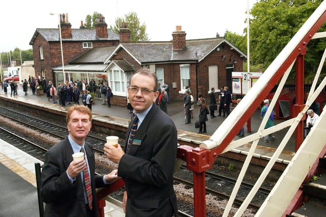 Colin Burgon, MP for Elmet, left, pictured with Stuart Baker, deputy managing director of Northern Spirit, toasting the opening of the refurbished Garforth Station with a cup of coffee in 2000.