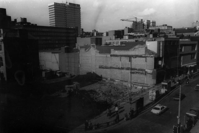March 1982 after the 1960s Saxone building, at junction of Boar Lane with Briggate, had just been demolished. The 19th century building that originally stood on this site, at the junction of Boar Lane and Briggate, (right) had housed Pullan's Central Shawl and Mantle Warehouse, then Sutton's Mantle shop before Saxone's shoe shop took over circa 1908. PIC: David L. Thompson