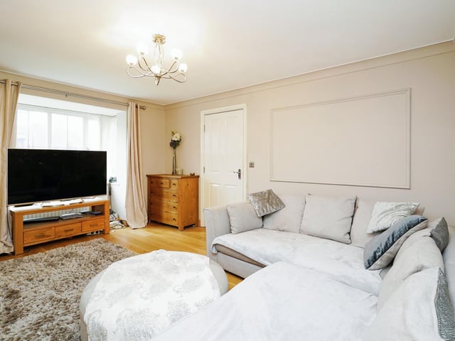 The delightful lounge has plenty of natural light and good sized living space.