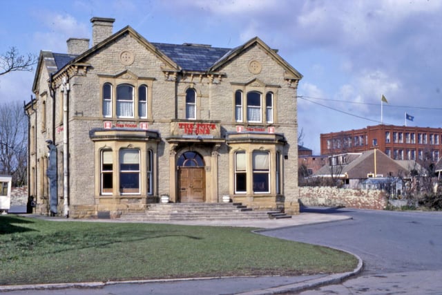 The Four In One Hotel, a free house on Gelderd Road, close to Branch End. The mill at Branch End can be seen on the right. The Four In One had originally been a residence known as Deanhurst. In later years it became the Derby Hotel then more recently Gildersome Lodge Hotel before being demolished. Pictured in March 1984.