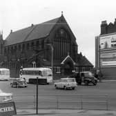 St. Patrick's Roman Catholic Church standing at Woodpecker Junction. The coaches are in New York Road, the properties to the right are in Burmantofts Street, Marsh Lane goes off from the bottom left-hand corner and York Road is the junction at the right edge. The Woodpecker pub, after which the junction is named, is off camera, bottom edge.