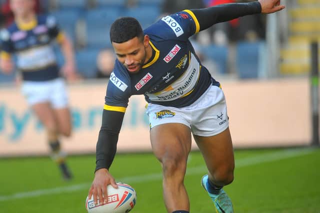 Kruise Leeming, seen scoring for Rhinos on Boxing Day, is vying for a place in the starting 13 after dropping to the bench in at the end of last season. Picture by Steve Riding.