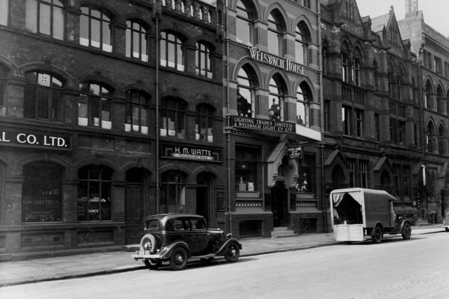 A parade of businesses on Park Place in August 1937. Pictured, from left to right, is Sunco - electrics. H.M Watts - manufacturers agent. The tallest building is Welsbach House which encloses the businesses of the Lighting Trades Ltd and Welsbach Light Co. To the right is Greenwood and Walsh Ltd.