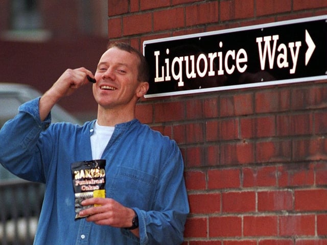 Chris Pennock celebrates with a bag of Pontefract Cakes in September 1996 after campaigning to get Ropergate/Beastfair Street changed to Liquorice Way.