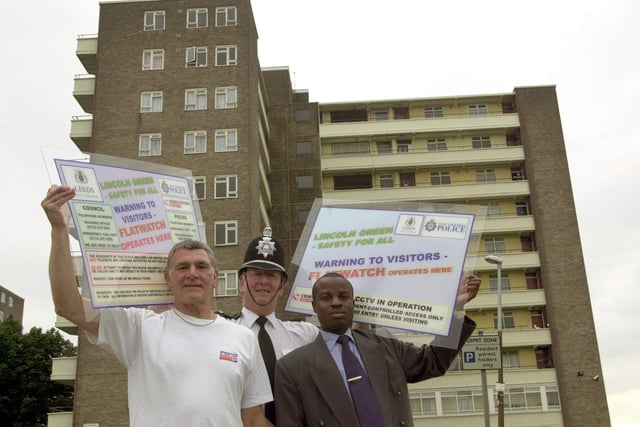 The Flatwatch scheme was launched in Lincoln Green in July 2000. Pictured centre is  PC Tony Sweeney with, from left, coordinators Alan Hitchen and right, Johnson Ogunyomi.