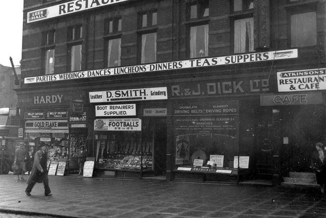 Eastgate in September 1937. In view of Atkinsons Restaurant and Cafe (on the right) at number 2 Eastgate. R. & J. Dick belting manufacturers can be seen next door on the left with David Smith, Leather Maunfacturers at number 6. At number 8 is Charles Hardy, Hairdresser and Confectioner can be seen at number 2 on junction with Harewood Street.