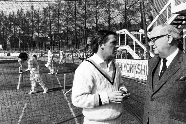 New Yorkshire CCC president Sir Kenneth Parkinson gets some inside information from coach Doug Padgett on the county's prospects for the coming season during a visit to the Headingley nets to meet the players in April 1974.