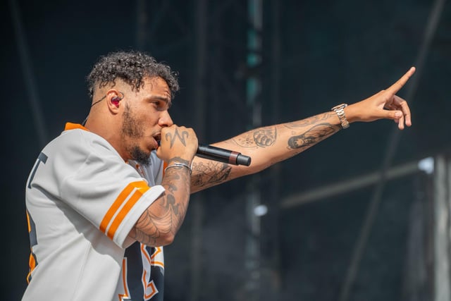 AJ Tracey on stage.